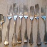 Set of 7 forks and 1 spoon in silver metal