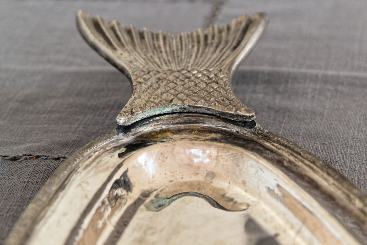 Ancient fish dish in silver metal