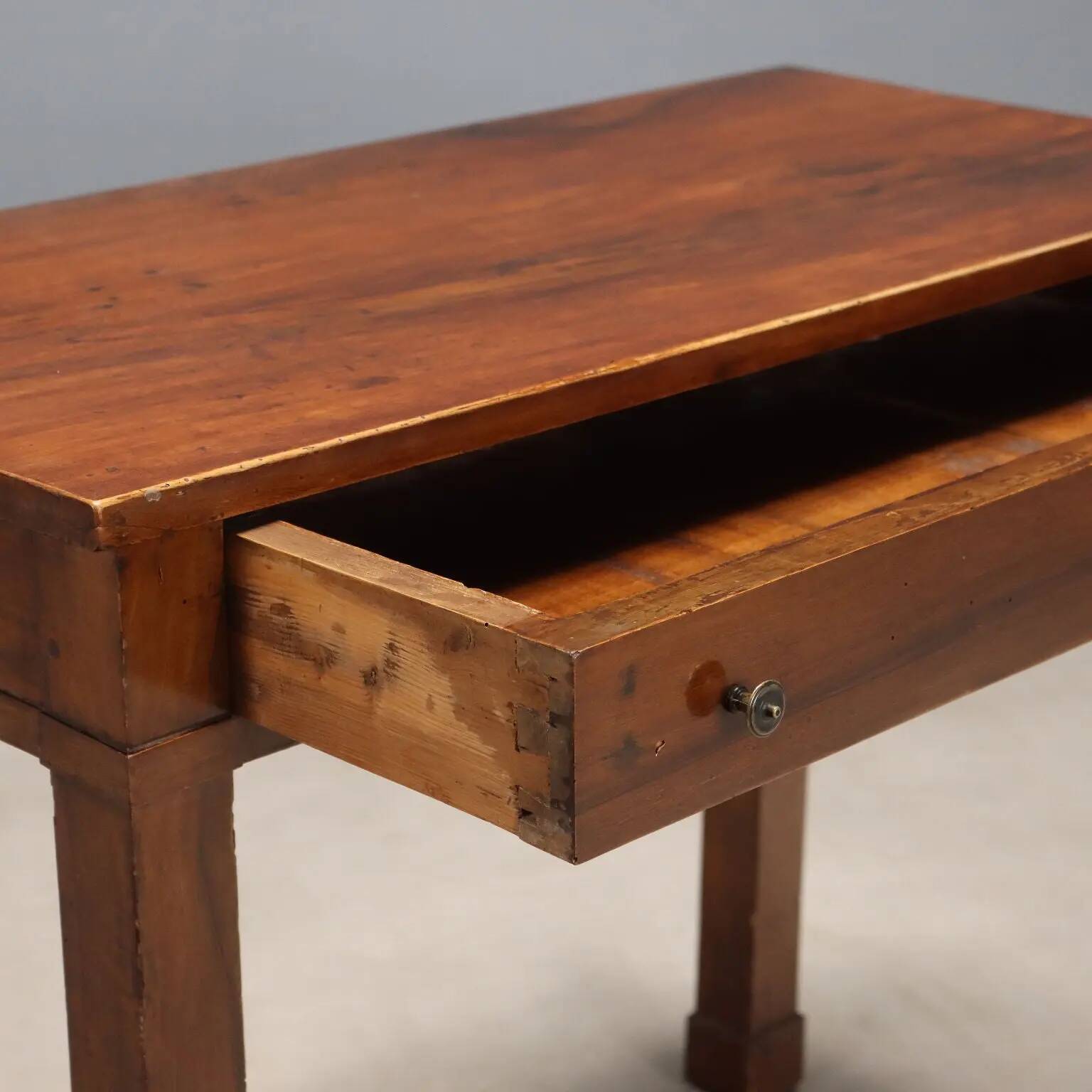 Ancient walnut console empire with drawer, Italy, 19th century.