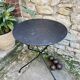 Iron pedestal table