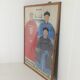 A framed Chinese ancestral portrait is a traditional hand-painted