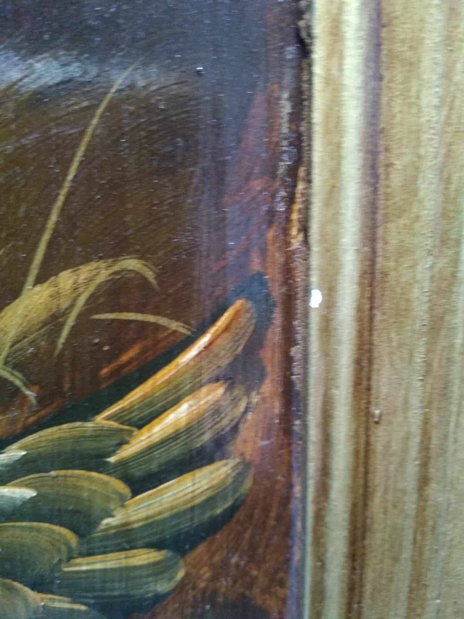 Oval mirror in duck pattern frame