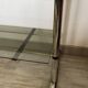 Chromed metal tubular shelf with smoked glass.
