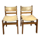 Pair of Maison Regain leather chairs