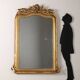 Eclectic antique mirror in gilded wood, Italy, 19th century