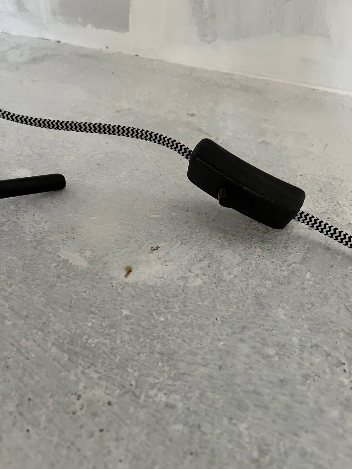 Vintage industrial lamp with a metal frame.