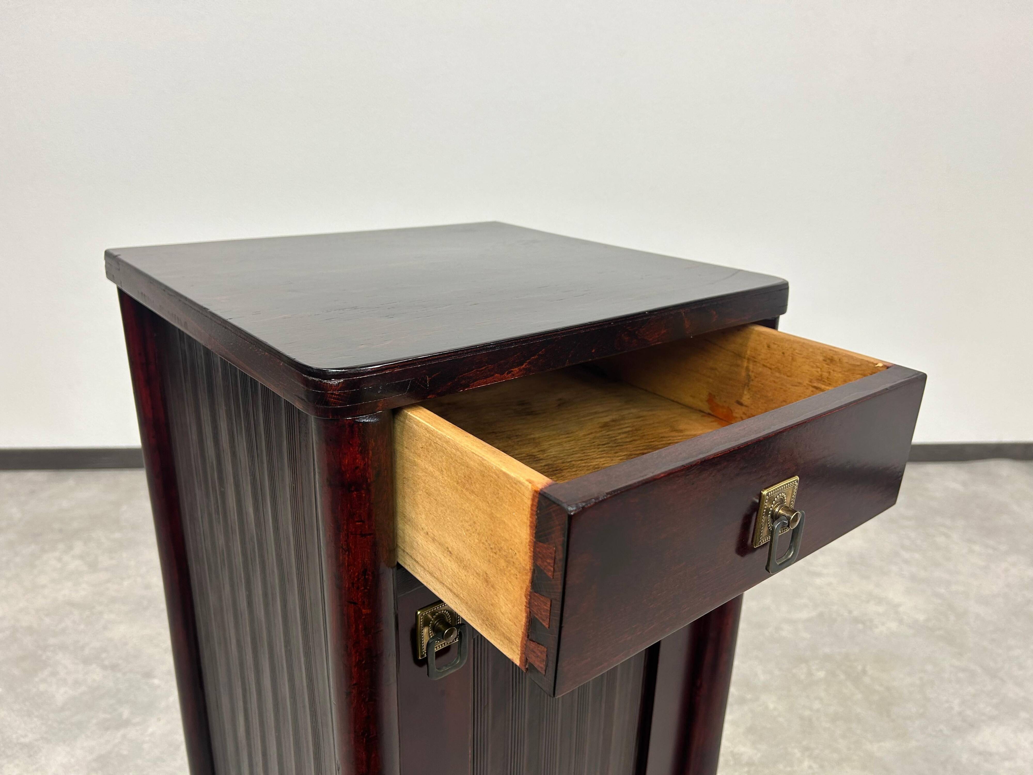 Secession bedside table by J&J Kohn