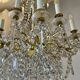 golden bronze chandelier in Louis XVI style