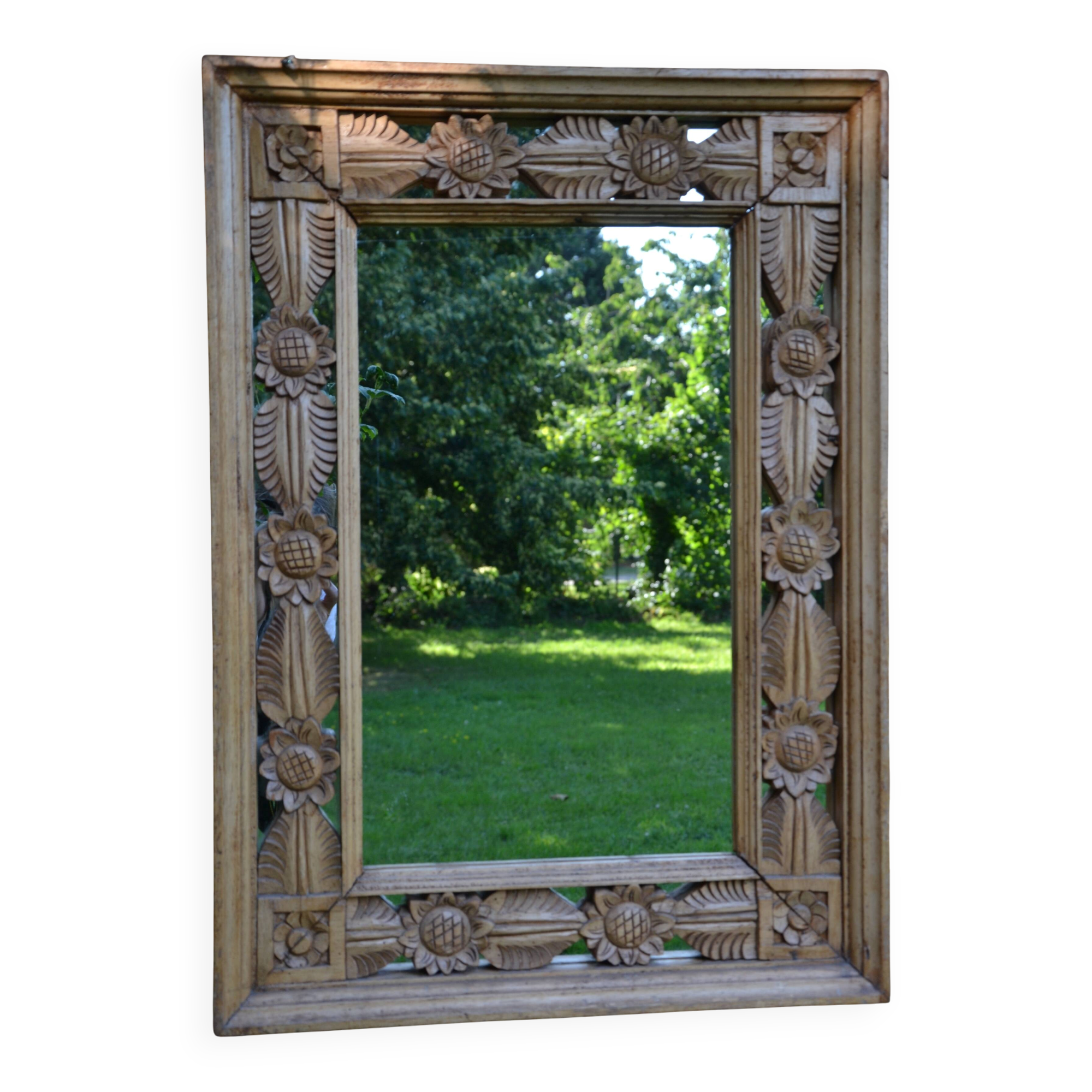 Large carved wooden mirror
