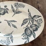 Plat ovale décor fruits en terre de fer de Grigny