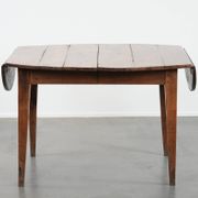 Rare antique oval French extendable dining table made of fruitwood