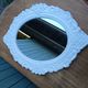 Oval mirror with white frame