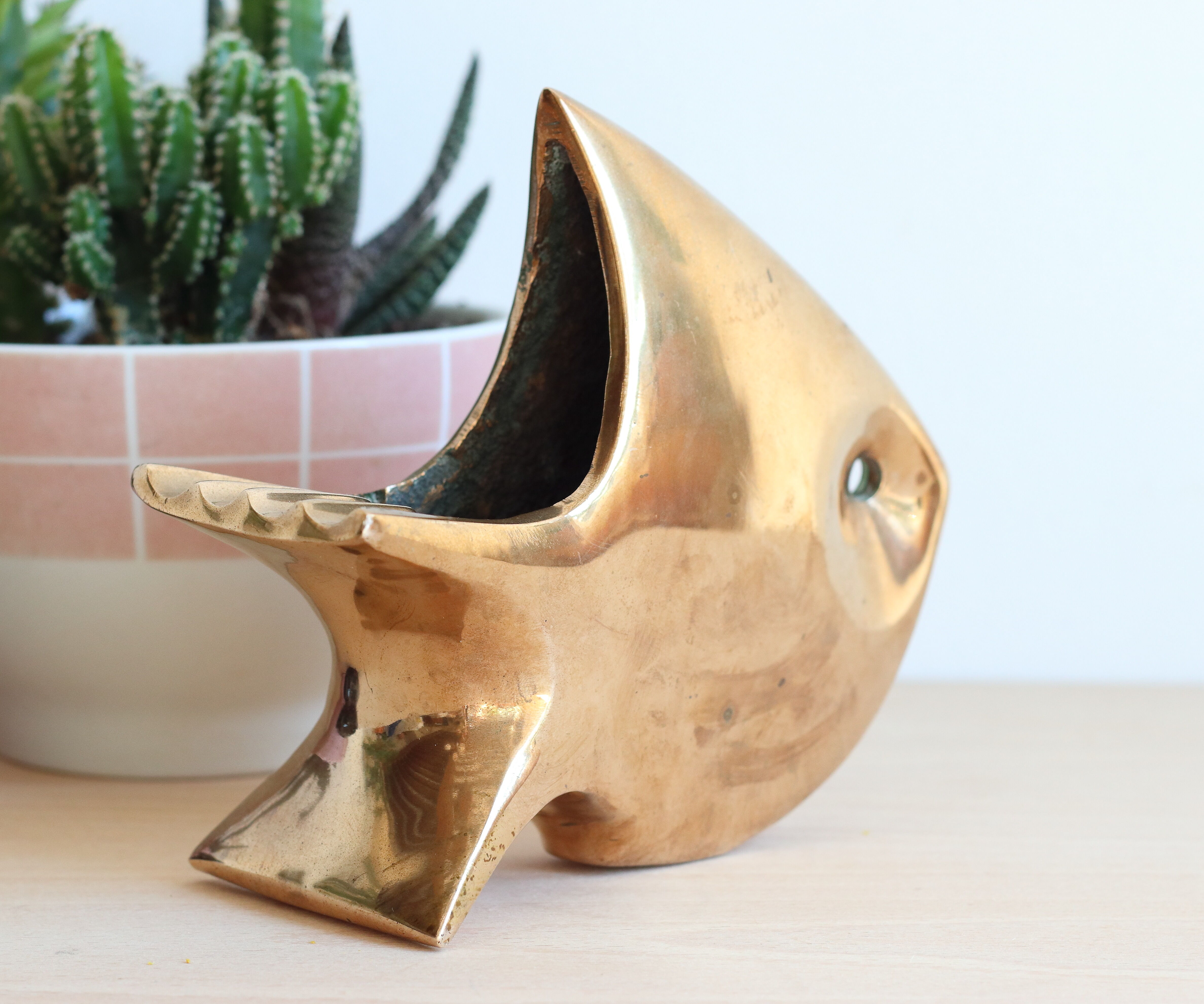 1960s solid brass ashtray in the shape of a stylized fish