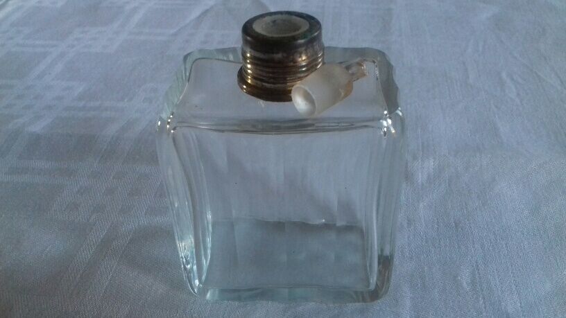 Lot of 4 glass toilet bottles, silver metal caps