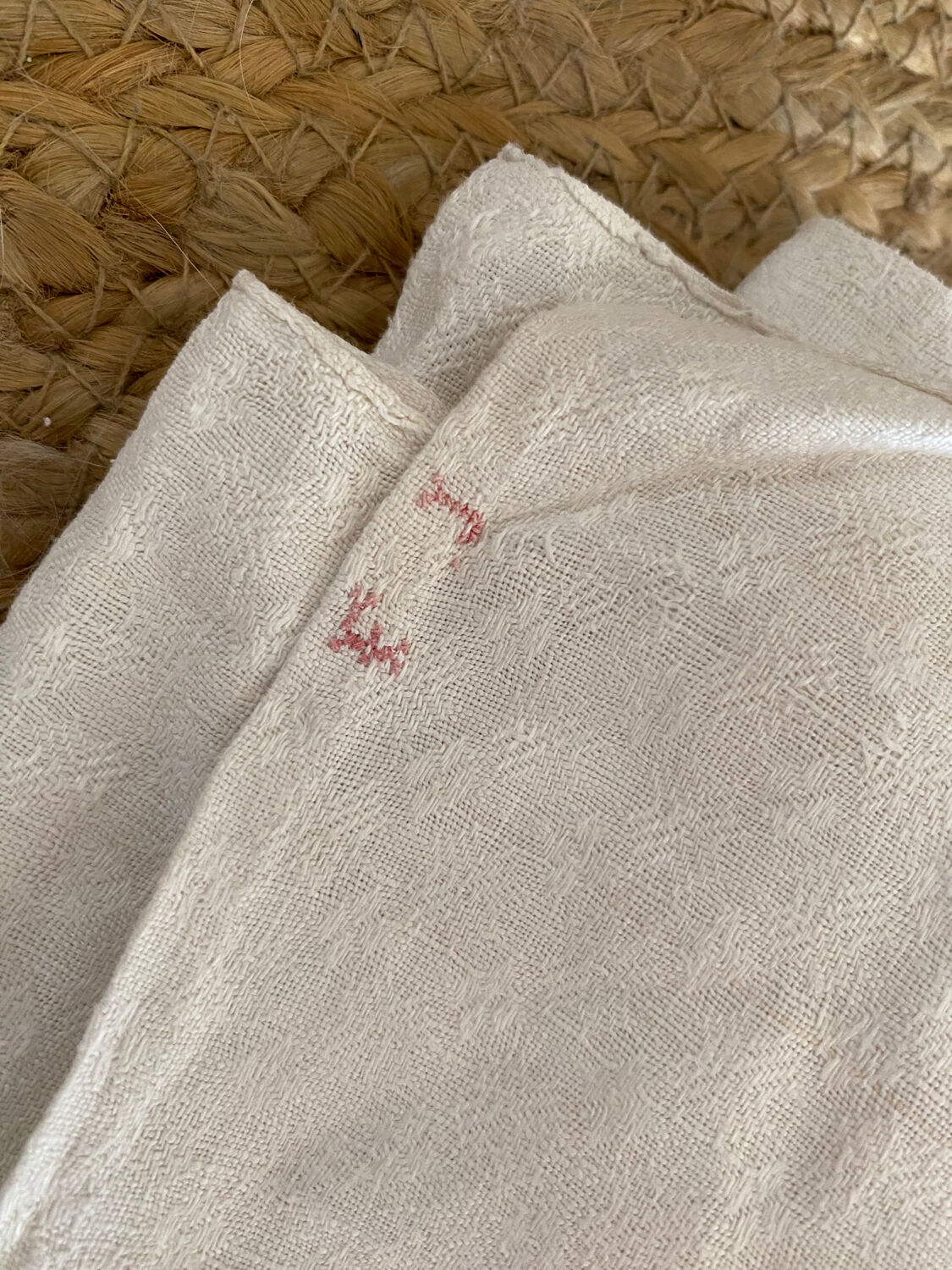 Old white cotton tablecloth.