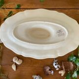 Antique sauce boat in Sarreguemines earthenware.