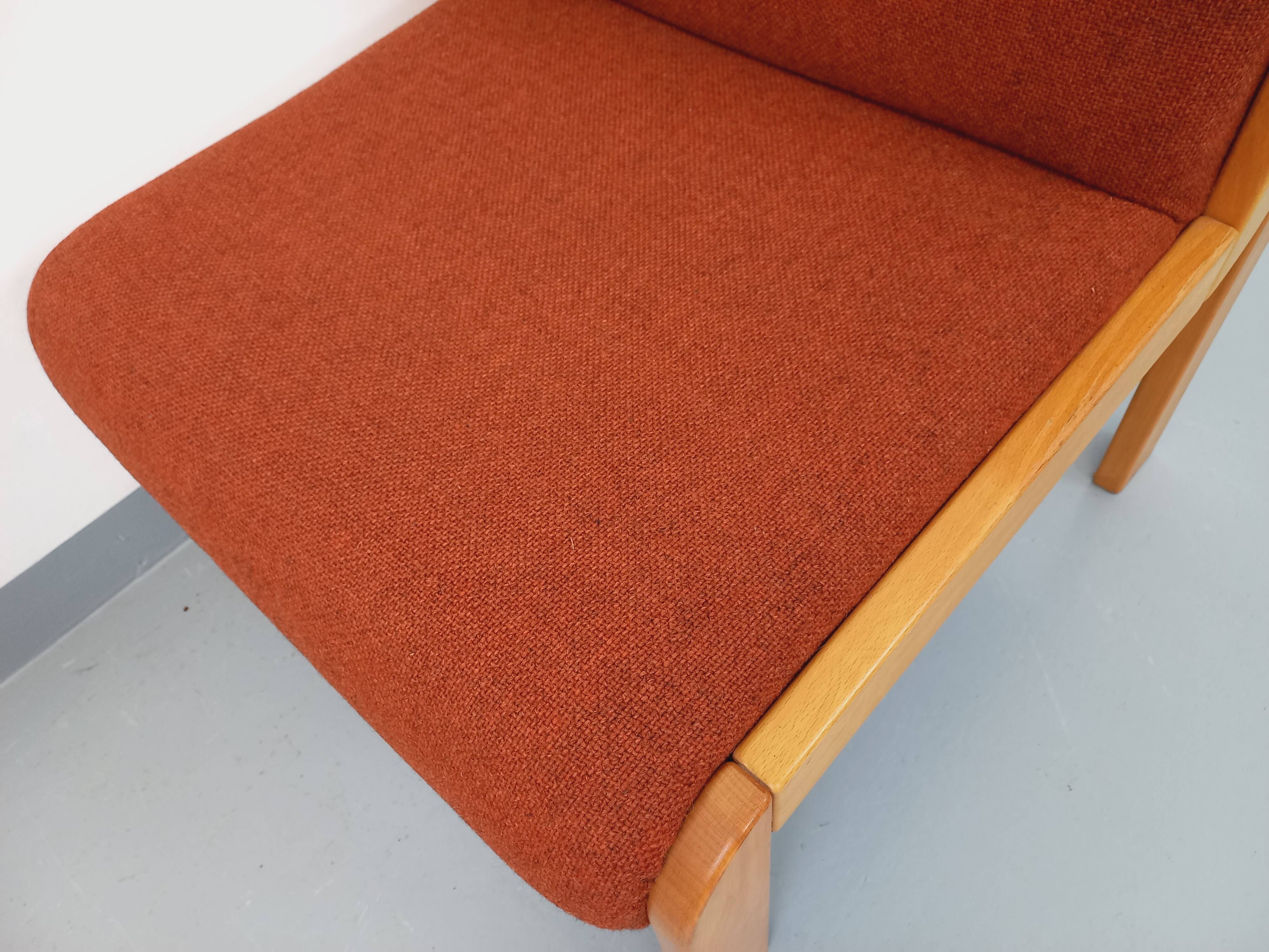 Vintage Fröscher armchair in orange fabric and wood from the 70s 80s