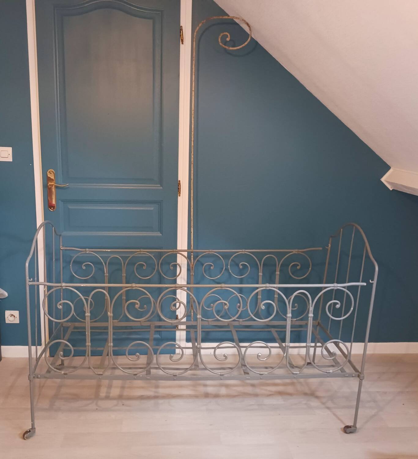 Wrought iron children's bed from the late 19th century.