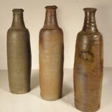 Lot de trois bouteilles anciennes en gres normand