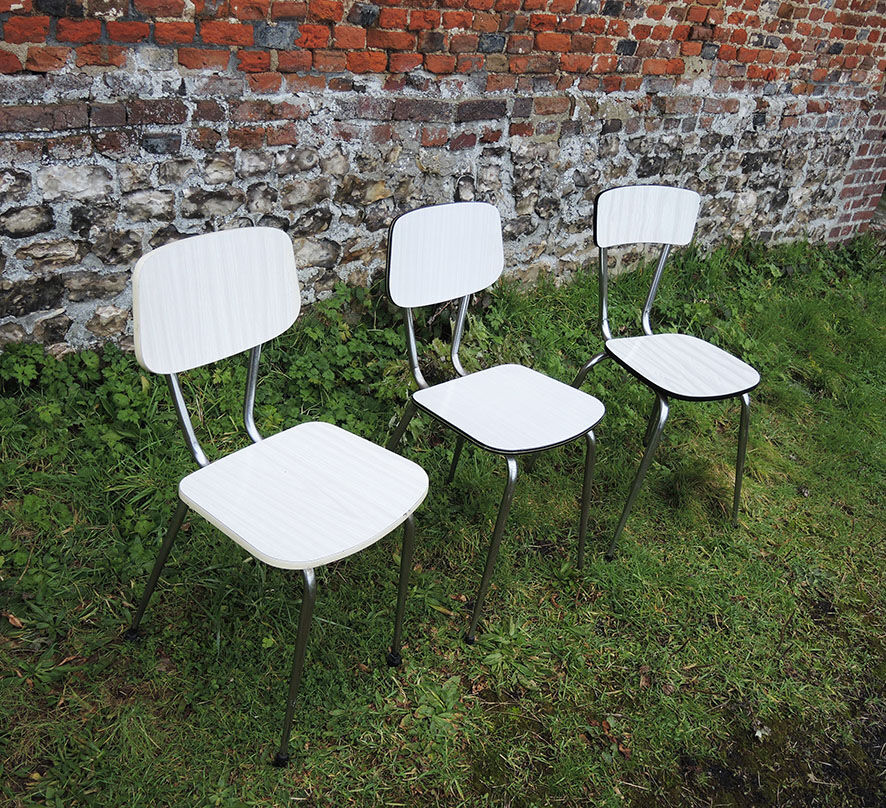 3 old white Formica chairs