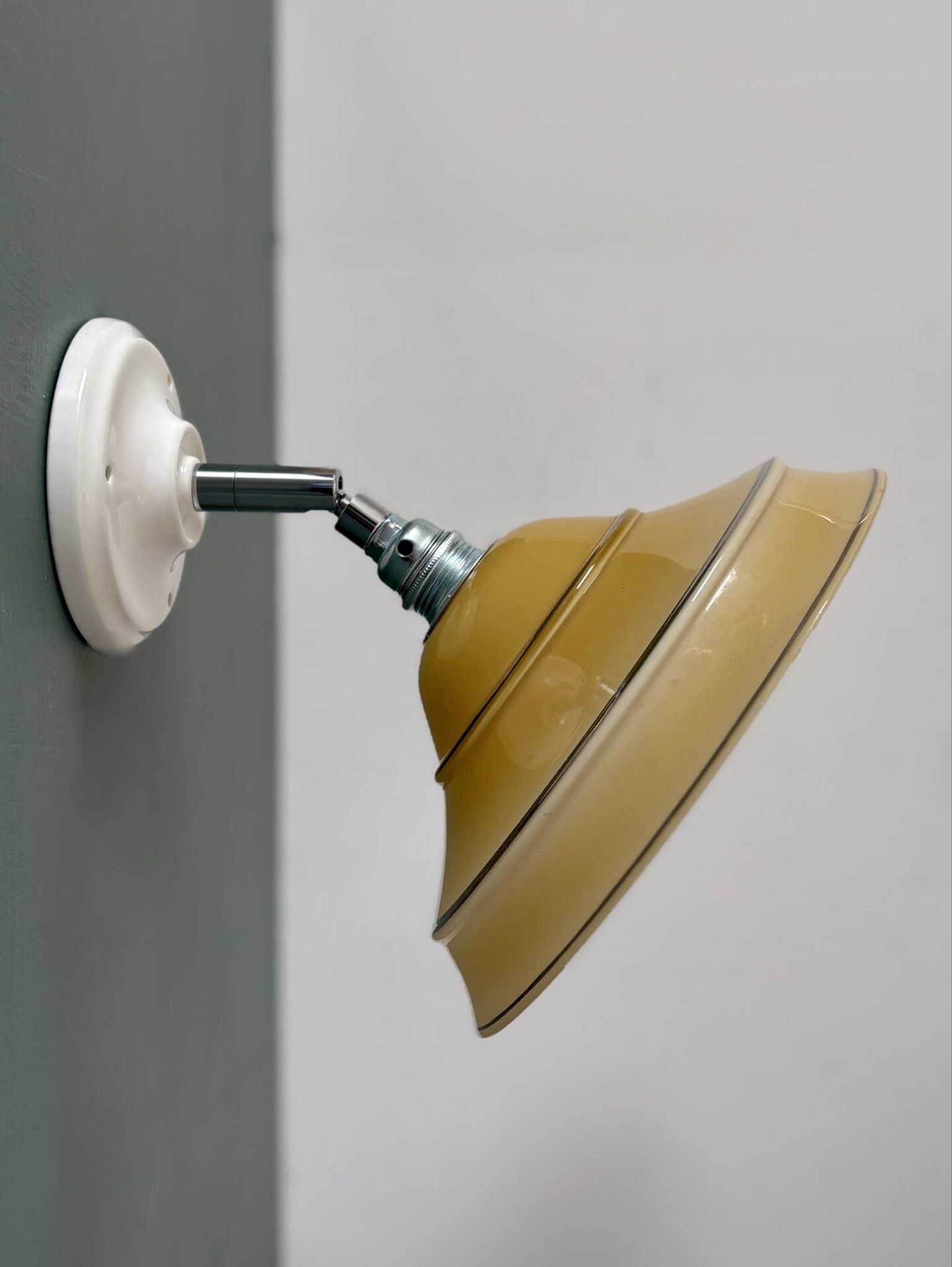 Vintage lampshade in yellow opaline with silver trim.