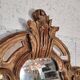 Rococo Style Mirror in Gilded Wood with Sculpted Pediment