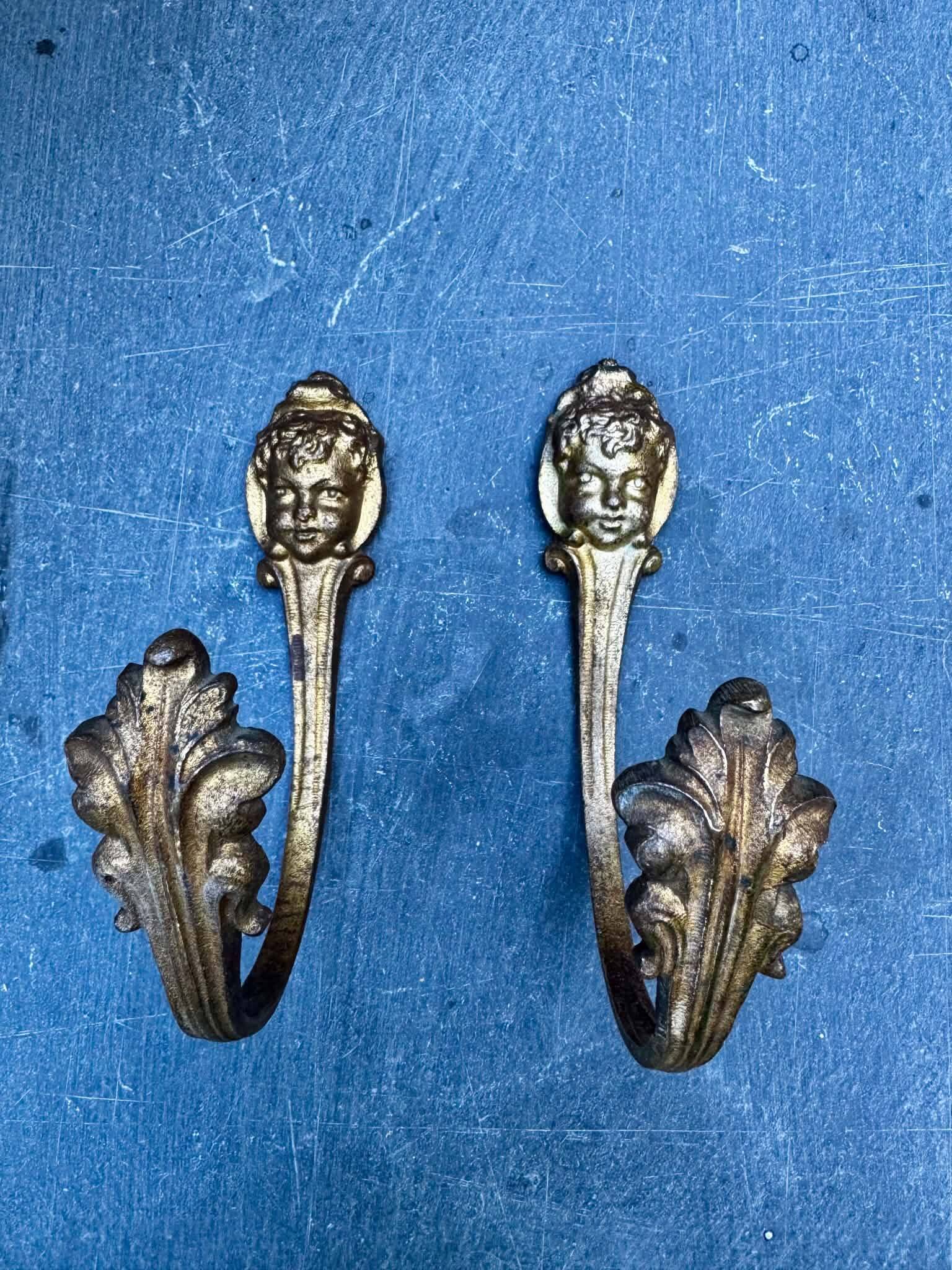 Pair of bronze putti coat hooks signed Art Nouveau period
