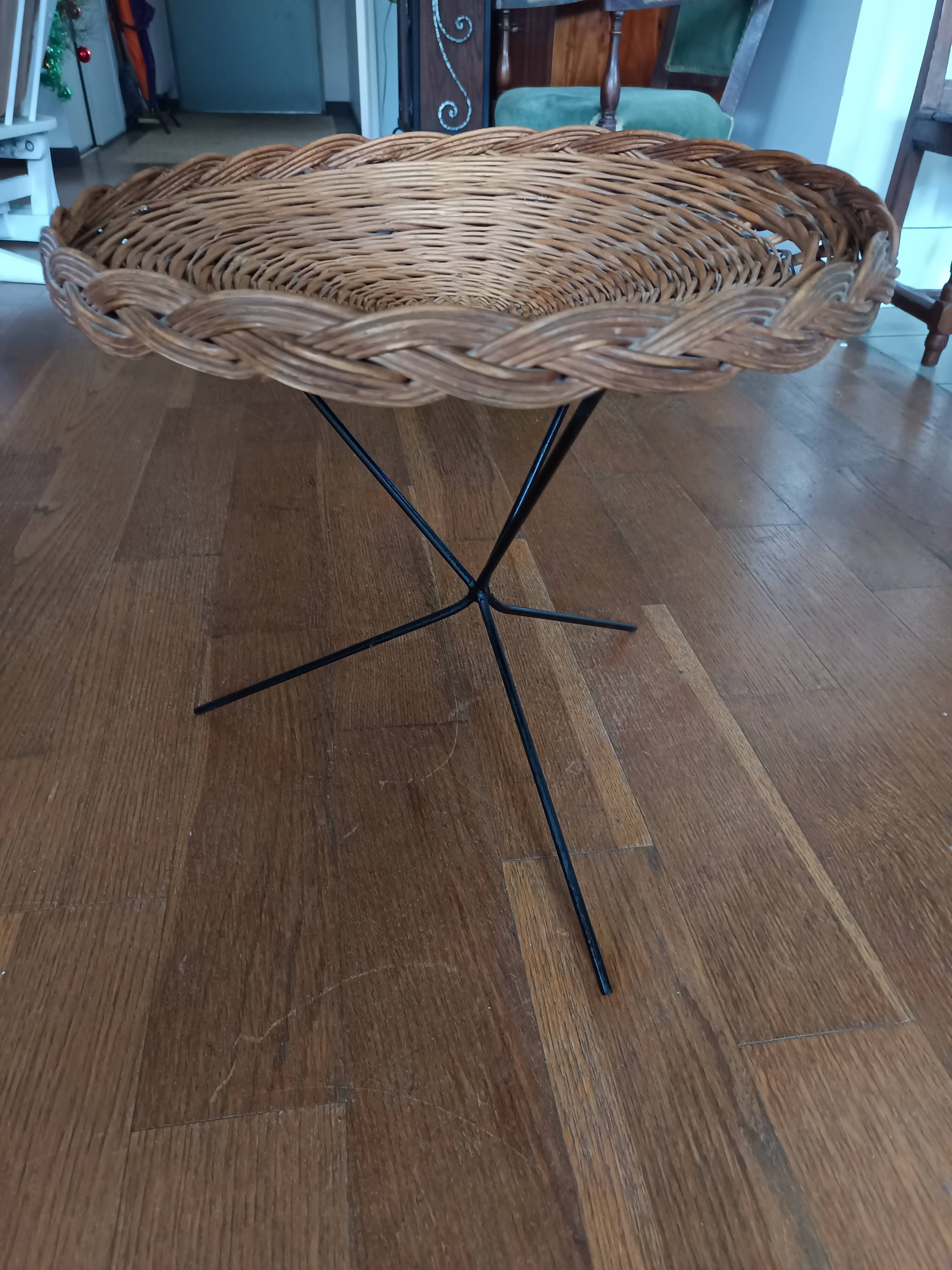 vintage wicker gueridon with a black metal tripod base from the 1960s
