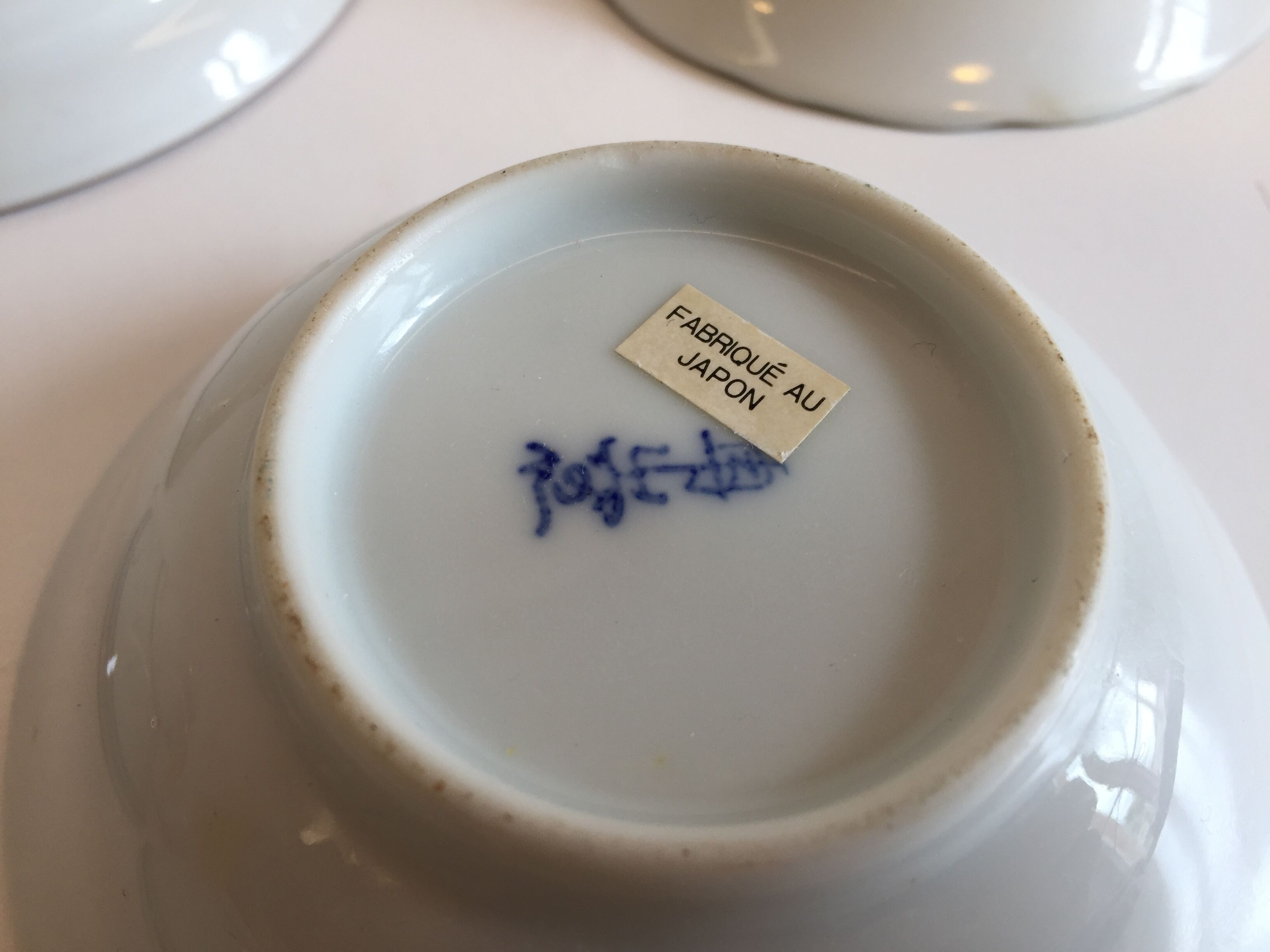 set of 4 bowls and 4 asian porcelain cups