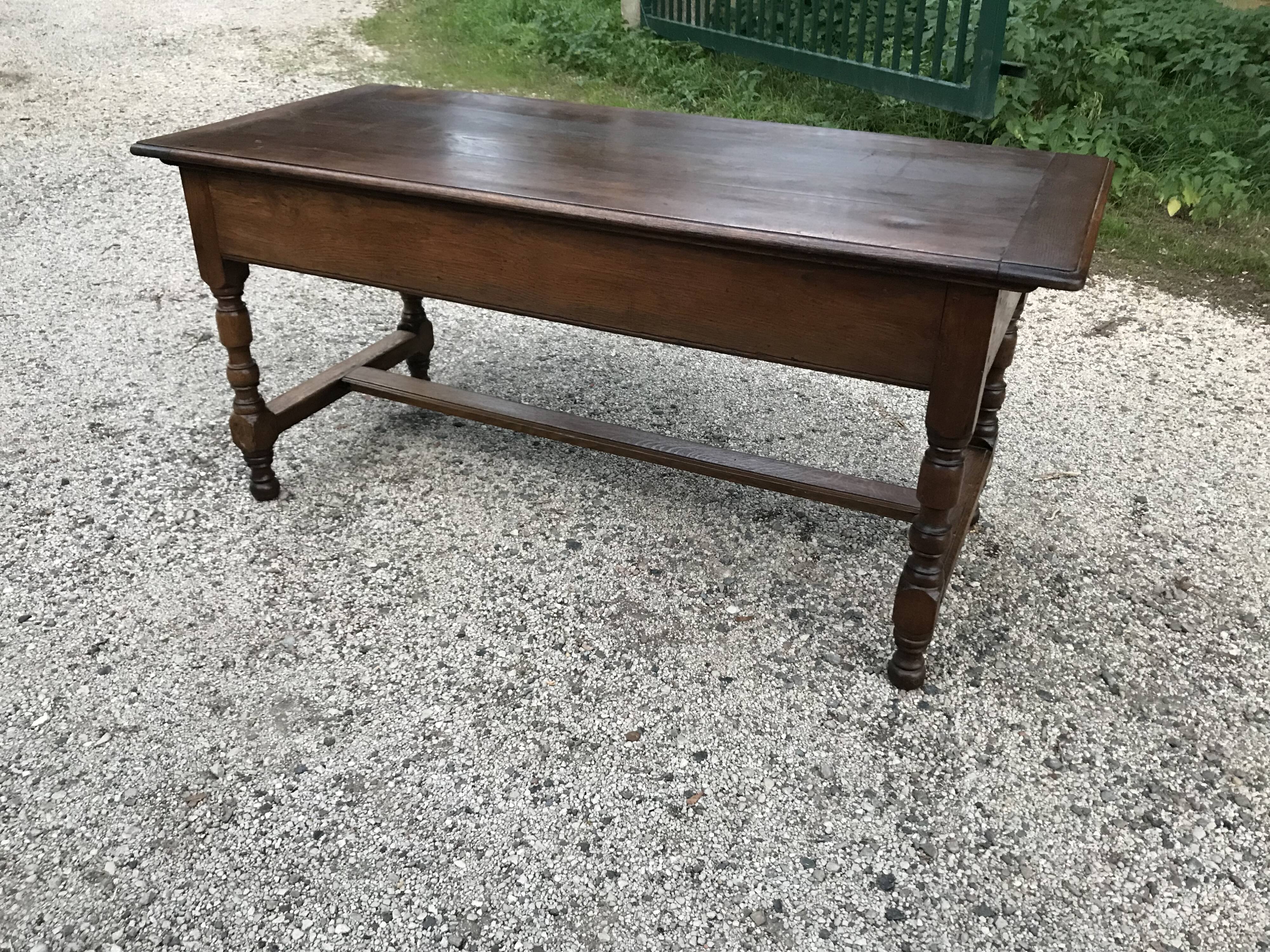 Croat farm table with a sliding tray