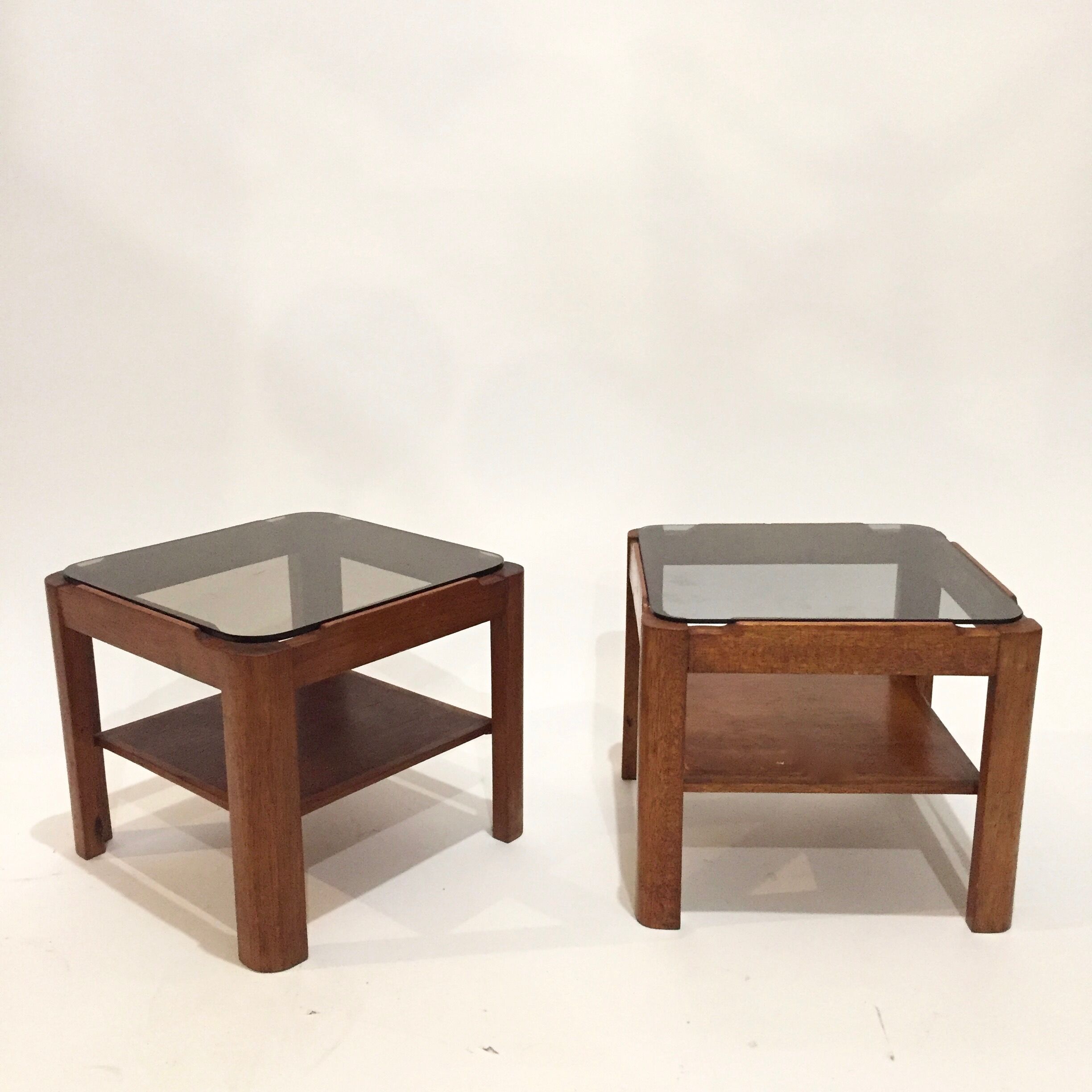 Pair of teak bedside tables and smoked glass