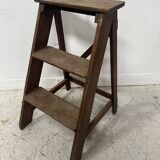 Library step stool with three steps in patinated beech, 20th century.