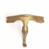 Small golden console