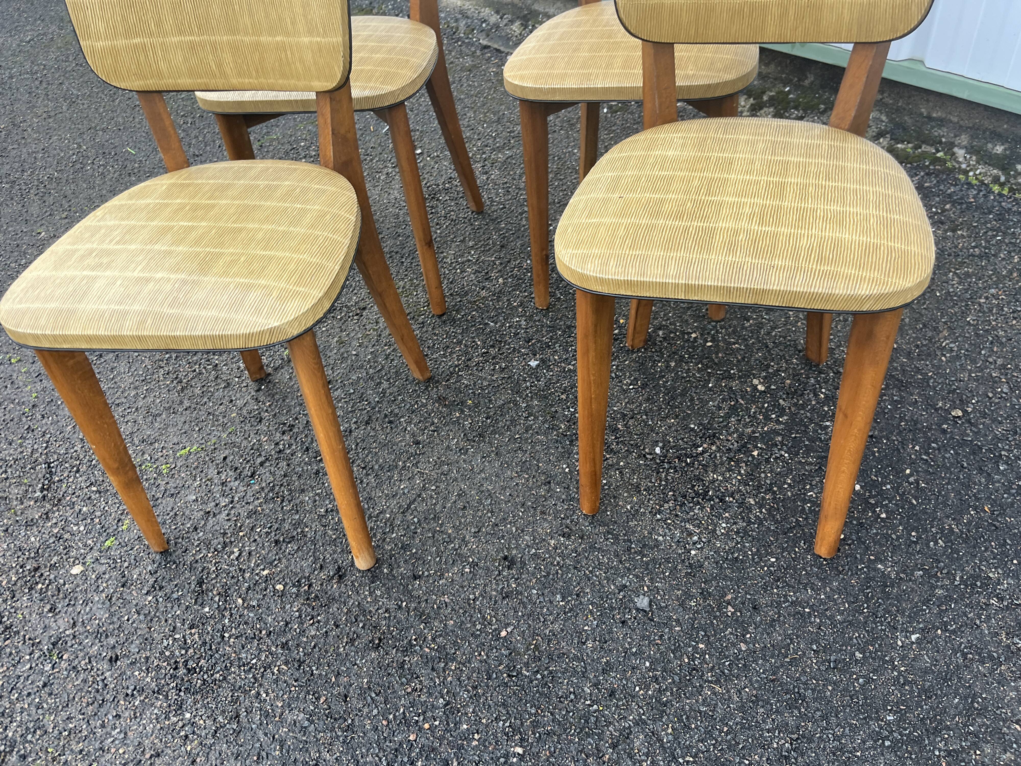 Set of 4 vintage chairs from the 50s and 60s in Scandinavian style.