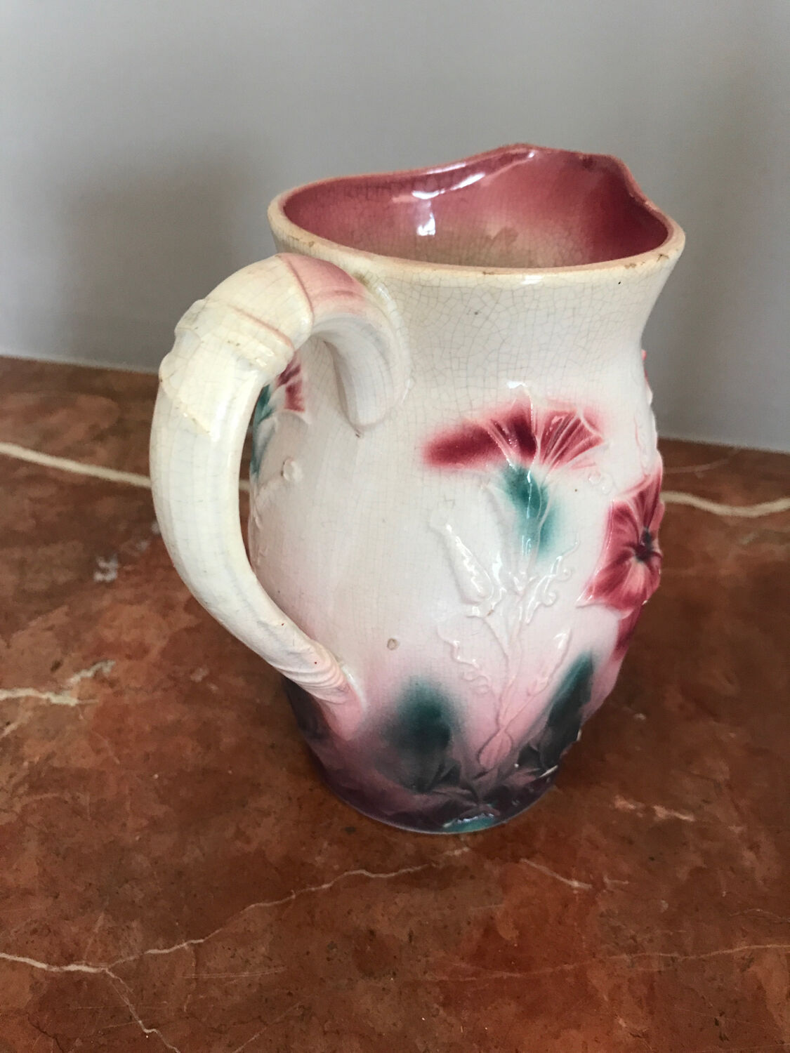 Pitcher in pink slip