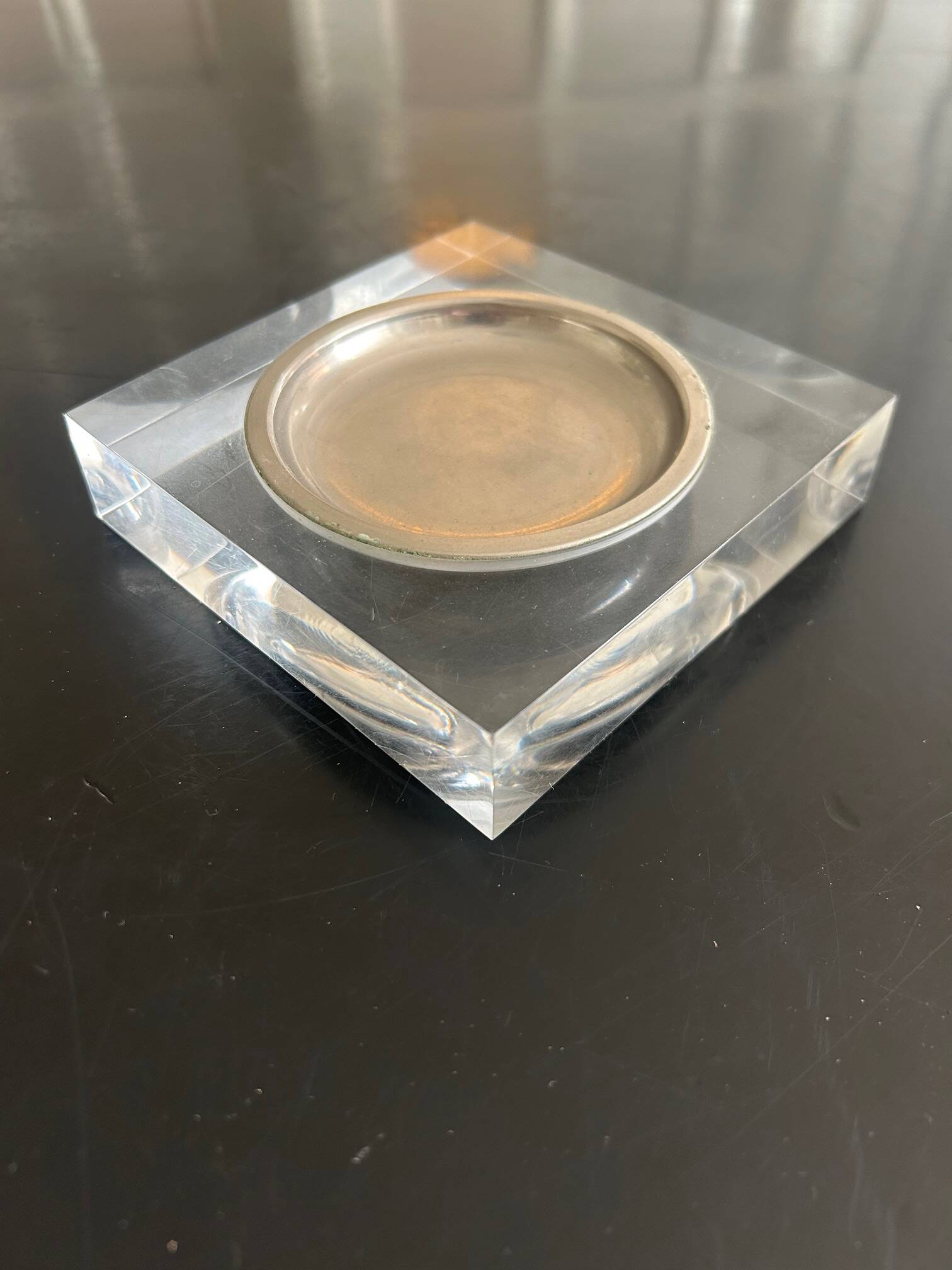 Plexiglass pocket emptier 1970