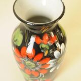 Vintage black ceramic vase with painted floral decoration – stylised colourful flowers.