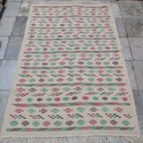 White carpet with multicolored Berber patterns handmade