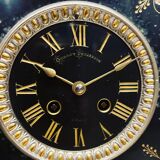 Black marble clock and brass ornament