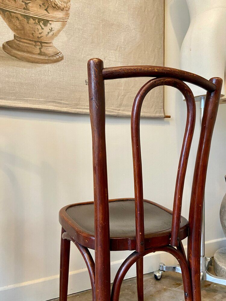 2 bistro chairs in arched and dark wood