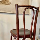 2 bistro chairs in arched and dark wood