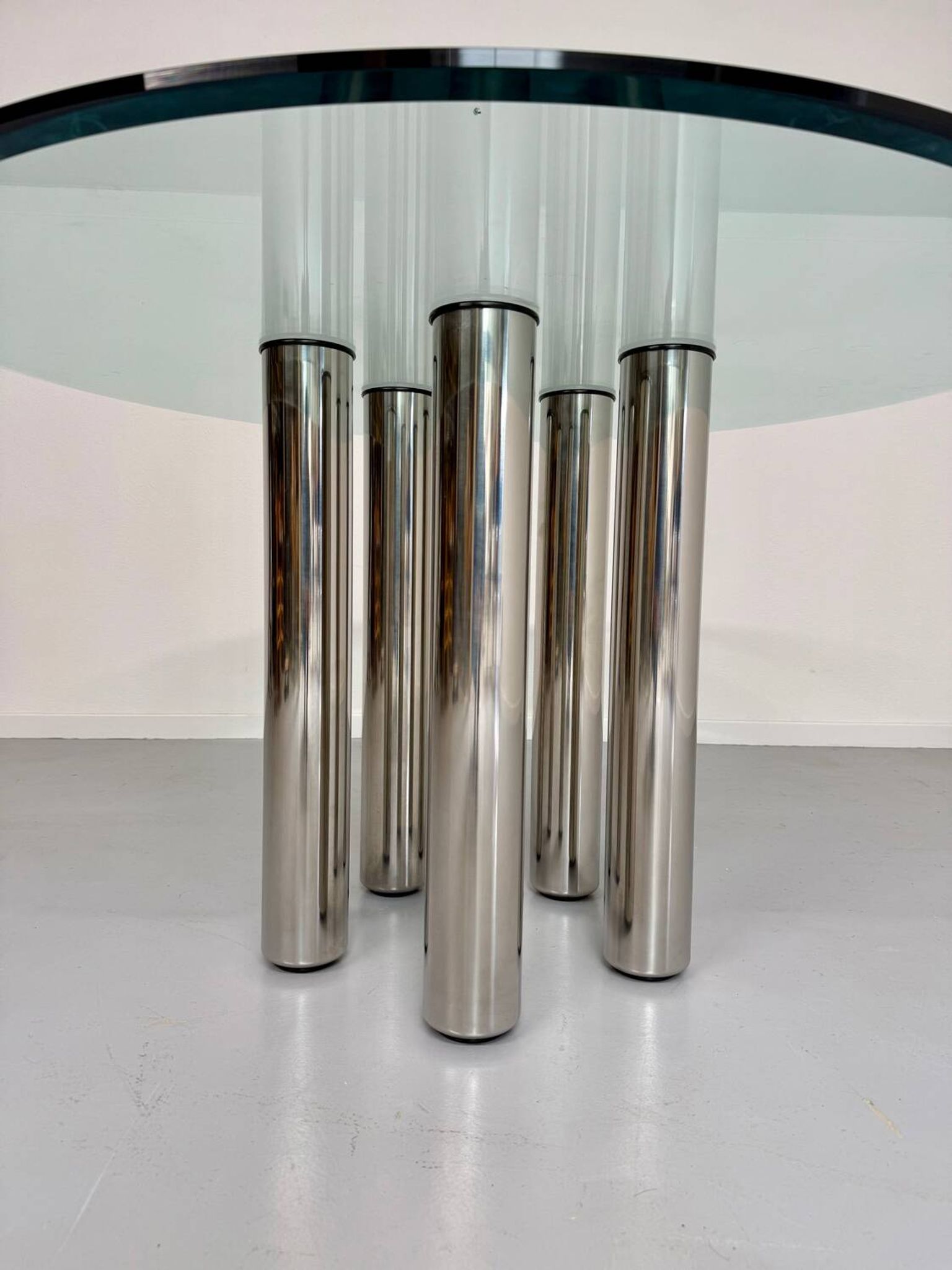 Round glass and metal dining table, Italian design from the 80s, vintage
