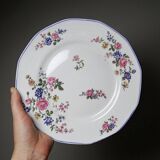 7 assiettes à dessert Bernardaud en porcelaine de Limoges décor floral, années 20-50