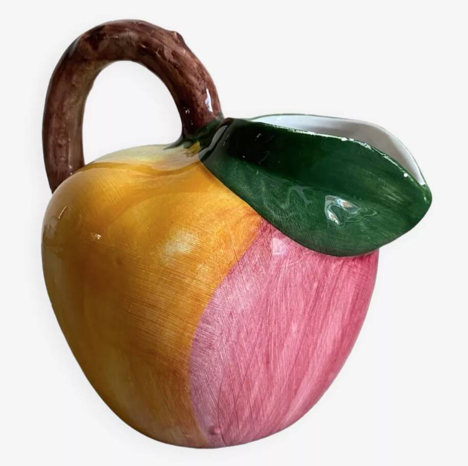 Earthenware pitcher evoking a fruit