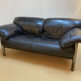 Pair of black leather sofas produced by Poltrona Frau, circa 1980/1990.