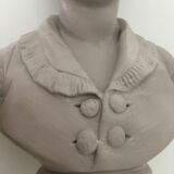 Cherub bust in platter