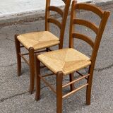 2 solid wood and straw chairs