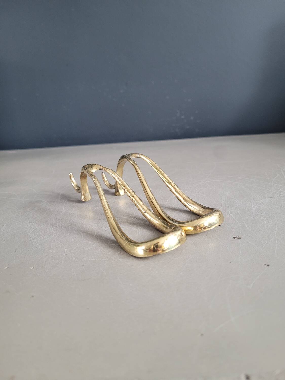 Antique brass pipe holder