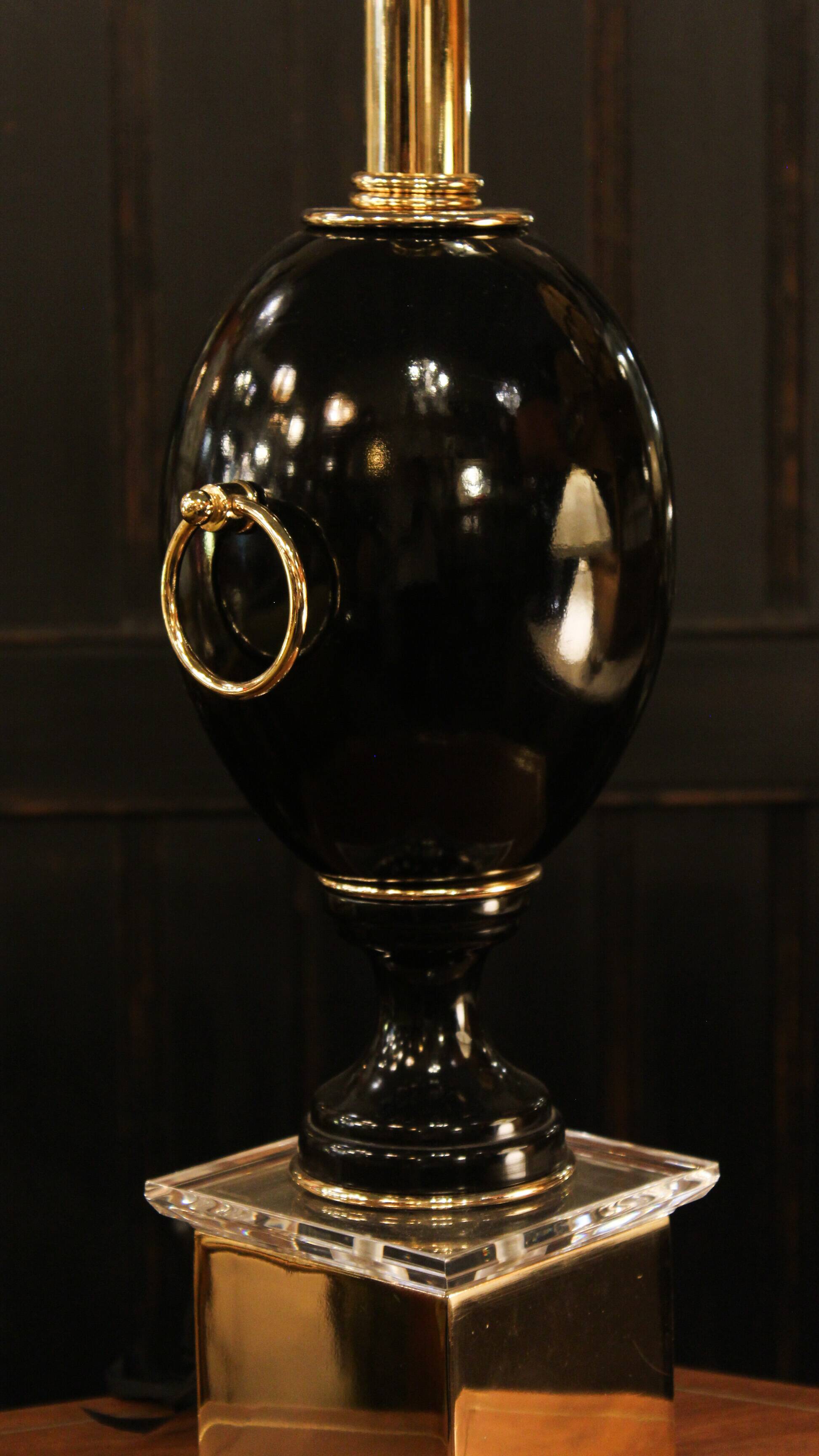 Black lamp in Hollywood Regency style