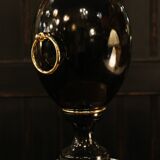 Black lamp in Hollywood Regency style